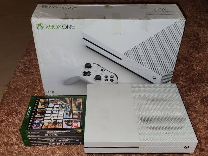 Xbox one S 1tb with 5 discs 0