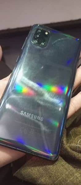 Samsung A31 all ok ha 10 by 10 full box ha koi masla ni ha 1