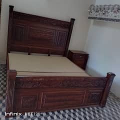 solid wooden bed