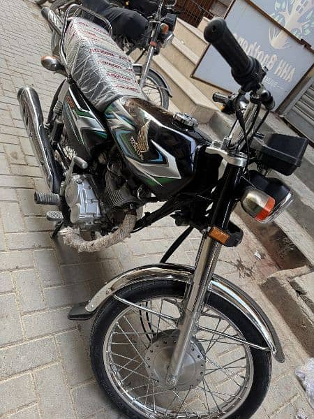 Honda CG 125 Model 2023 Like a New bike good condition buy an drive 11