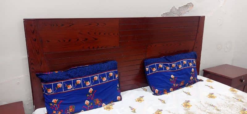 king size wooden bed set in a good aesthetic condition 2