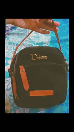 black classy dior hand bag with many compartments