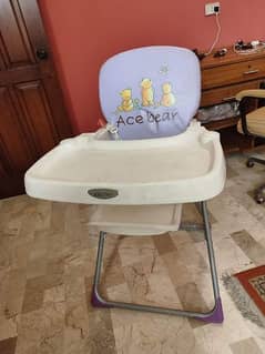 High chair for sale.