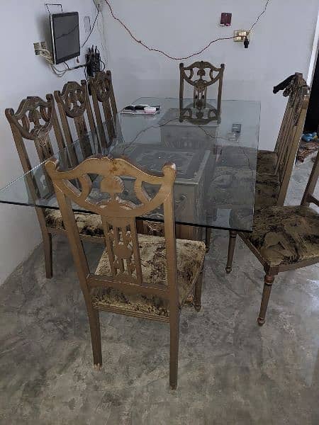 New dining table with new chairs and best condition center table 2