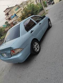 Mitsubishi Lancer 1.3 2004 outclass condition.