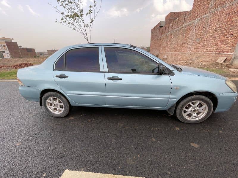 Mitsubishi Lancer 1.3 2004 outclass condition. 10