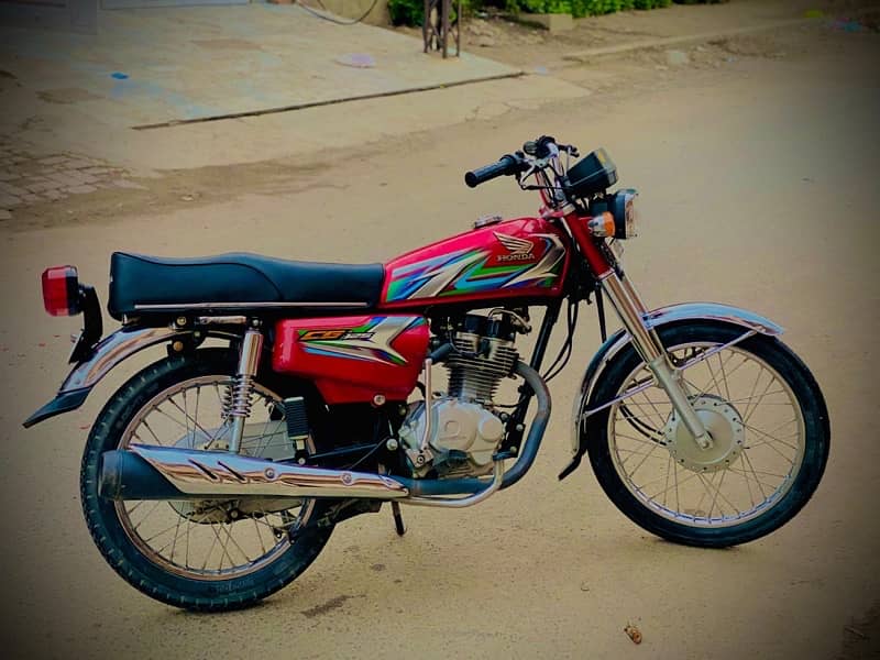 honda 125 red colour lush condition 1