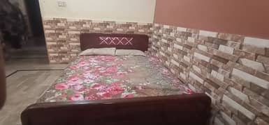 Wooden double bed