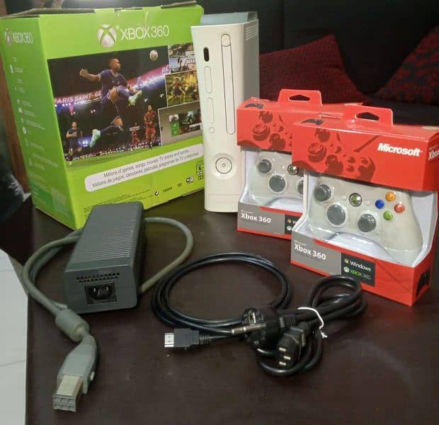 Xbox 360 with 2 controllers,power supply cable and HDMI cable 7