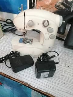 MINI SEWING MACHINE