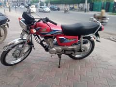 red Honda 125 model 23-24