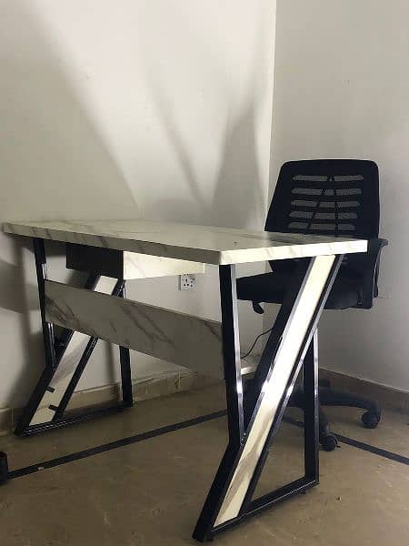 Marble  coted table and office chair 1