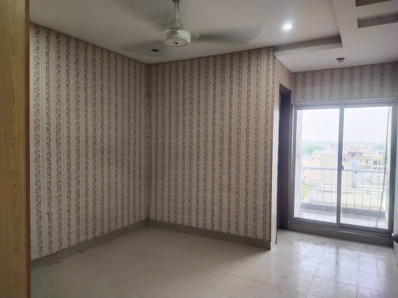 1 bed room flat available for rent jinah mall palaza izmeer town canal bank road Lahore 1