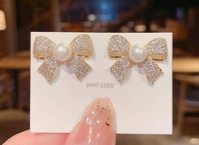 bow tie gold plated zircon studs 1