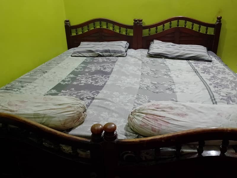 Two Single Pure Wooden Beds 0