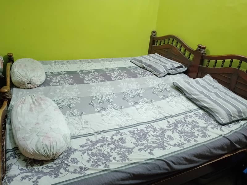 Two Single Pure Wooden Beds 1