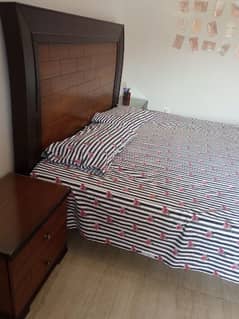 Bed with side table and mattress