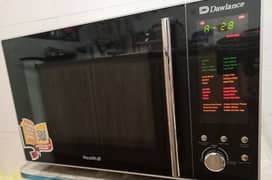 Dawlance DW 131-HP Microwave/grill oven 2 week used brand new