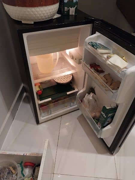 Dawlance  mini Fridge with built in freezer for sale. condition 10/10 1