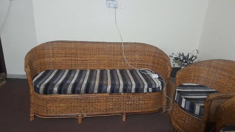 7 seater Sofa Set (made with cane) along with Tables 1