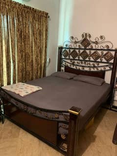 Queen size bed with mattress and 2 side tables