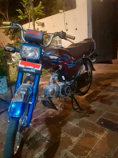 brand new honda  cd 70 2024  bike   with number plates 1