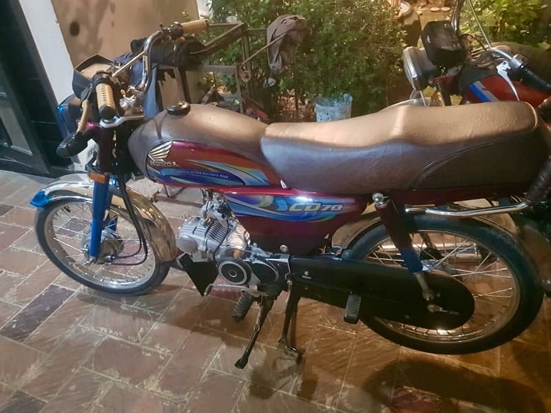 brand new honda  cd 70 2024  bike   with number plates 3