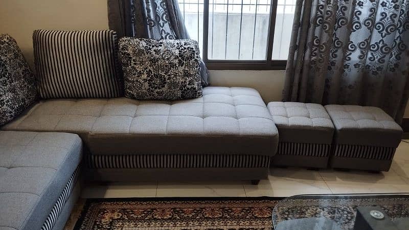 Grey L shaped Sofa with Center table 0