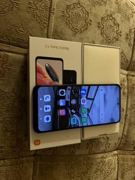 Redmi Note 12 8/256 dual sim pta approved ladies hand used 2