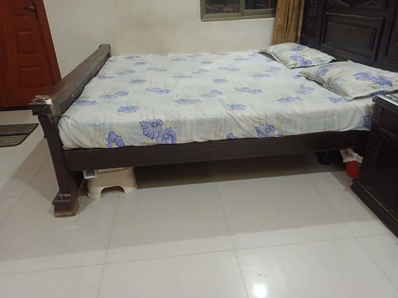 king size bed with mattress and two side tables 2