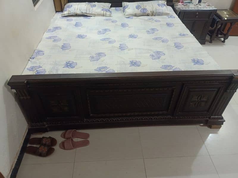 king size bed with mattress and two side tables 5