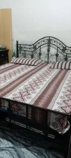 good condition black colour  with mattress A one condition  l