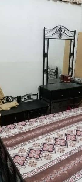 good condition black colour  with mattress A one condition  l 1