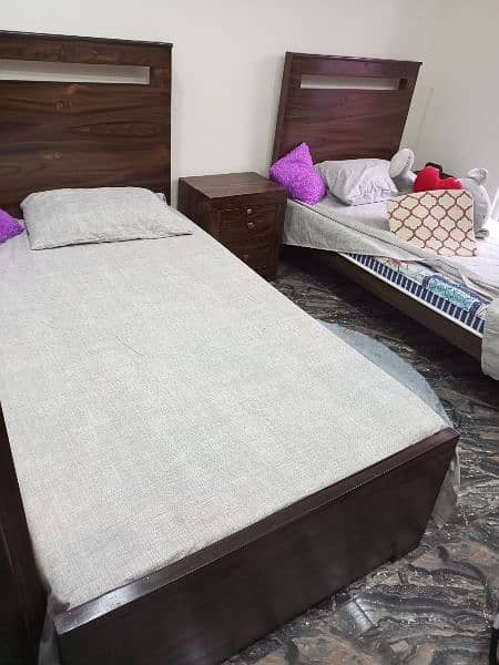 single bed pair with side table 1