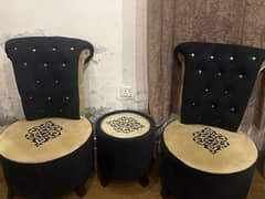 2 chairs with center round table