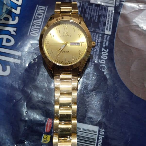 Real star golden color watch 1