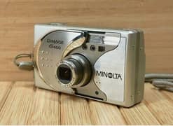 Minolta Dimage G400 4.0 MP Digital Camera with 3x Optical Zoom 0