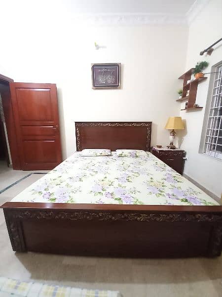 king size wooden bed available for sale in Bani gala Islamabad. 1