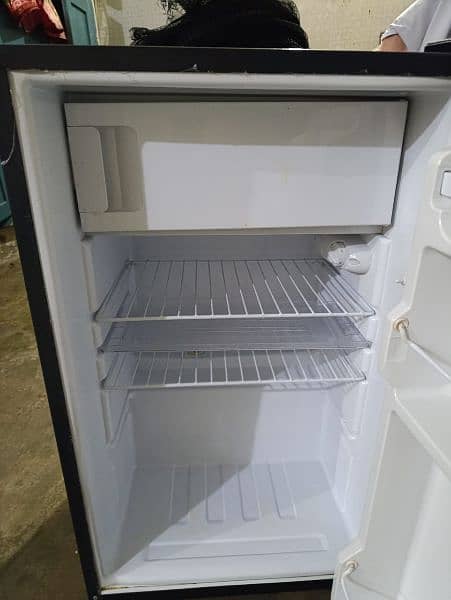 Dawlance mini fridge like brand new 3