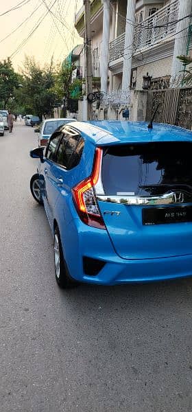 Honda Fit Hybrid 28km/Liter fuel Avg btr thn Axio Aqua Prius Vitz etc 2