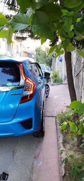 Honda Fit Hybrid 28km/Liter fuel Avg btr thn Axio Aqua Prius Vitz etc 5