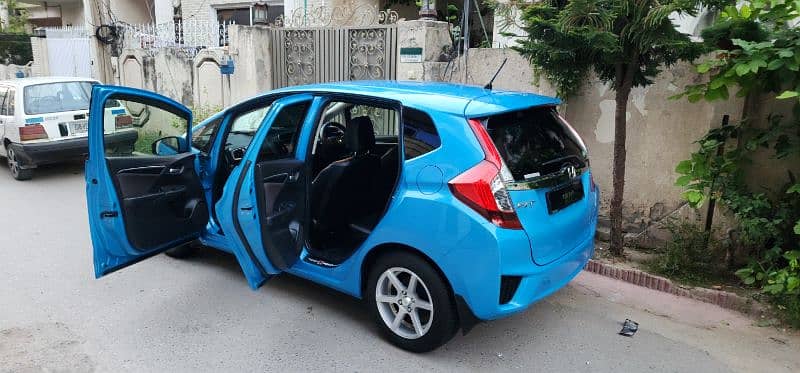 Honda Fit Hybrid 28km/Liter fuel Avg btr thn Axio Aqua Prius Vitz etc 6