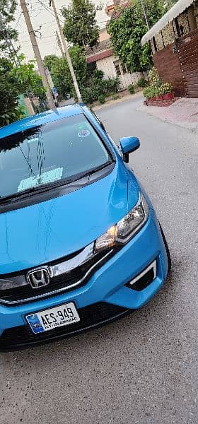 Honda Fit Hybrid 28km/Liter fuel Avg btr thn Axio Aqua Prius Vitz etc 7