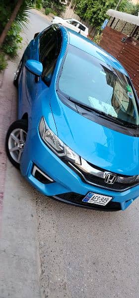 Honda Fit Hybrid 28km/Liter fuel Avg btr thn Axio Aqua Prius Vitz etc 9