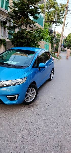 Honda Fit Hybrid 28km/Liter fuel Avg btr thn Axio Aqua Prius Vitz etc 12