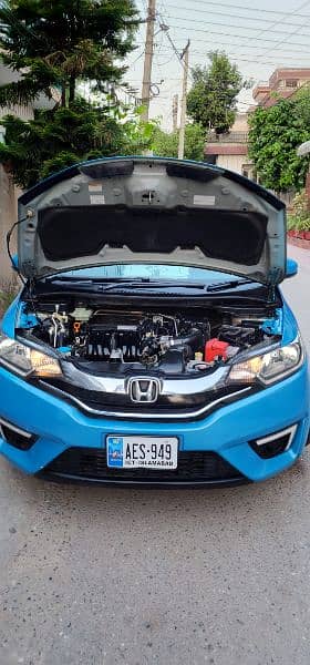 Honda Fit Hybrid 28km/Liter fuel Avg btr thn Axio Aqua Prius Vitz etc 16