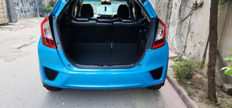 Honda Fit Hybrid 28km/Liter fuel Avg btr thn Axio Aqua Prius Vitz etc 17