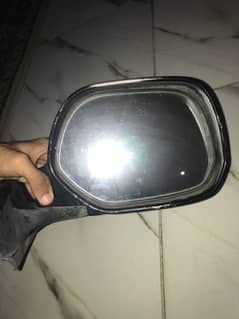 Retractable side mirror