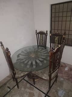 dining table with four chairs unused