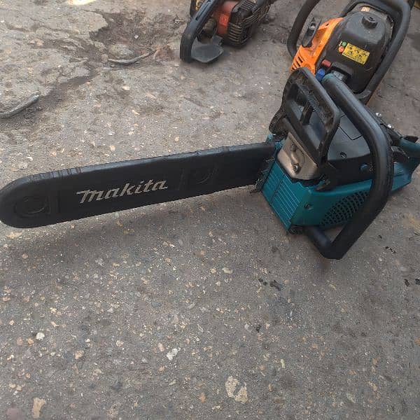 Makita DCS 341 Chainsaw 1